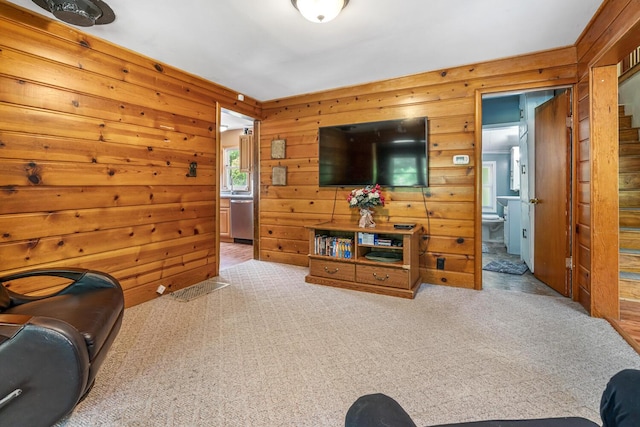 9303 W H Ave, Kalamazoo, MI 49009 - carpeted living area featuring wood walls