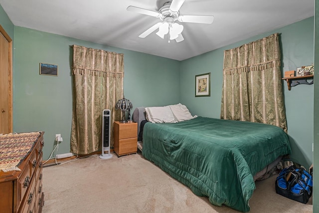 9303 W H Ave, Kalamazoo, MI 49009 - bedroom with carpet floors and a ceiling fan