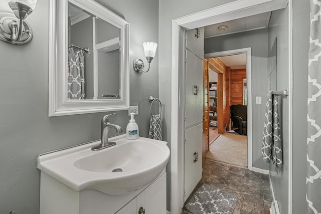 9303 W H Ave, Kalamazoo, MI 49009 - full bath with stone finish floors and vanity