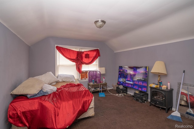 18459 Hubbell St, Detroit, MI 48235 - carpeted bedroom featuring vaulted ceiling and a wood stove