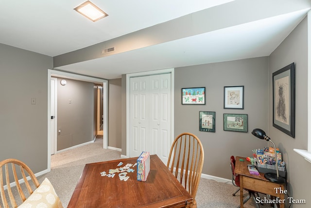493 Edgeworthe Dr SE, Ada, MI 49301 - dining space featuring light carpet and baseboards
