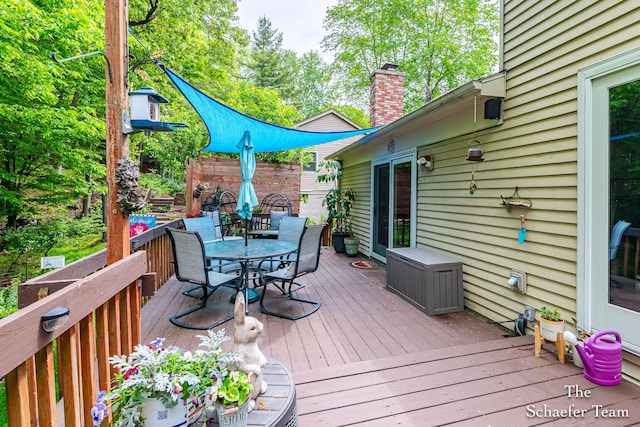 493 Edgeworthe Dr SE, Ada, MI 49301 - deck featuring outdoor dining space
