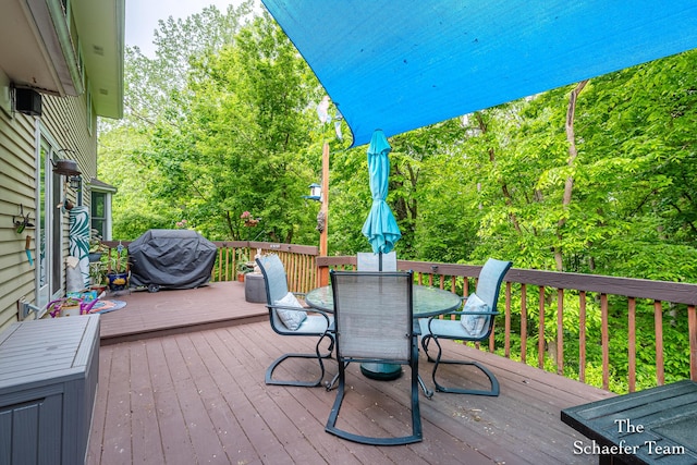 493 Edgeworthe Dr SE, Ada, MI 49301 - deck with area for grilling and outdoor dining area