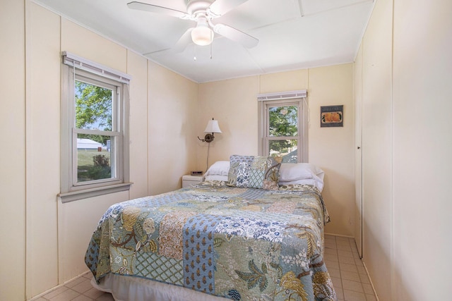 263 Waffle Dr, Coldwater, MI 49036 - bedroom featuring light tile patterned floors and a ceiling fan
