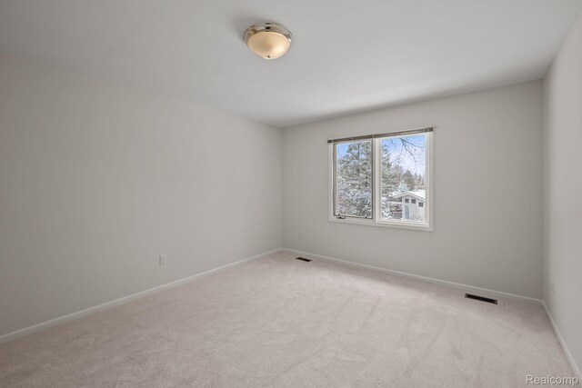 2729 Glenbrooke Ct, Bloomfield Hills, MI 48302 - spare room with light colored carpet and baseboards