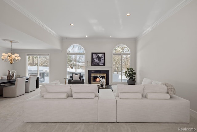 2729 Glenbrooke Ct, Bloomfield Hills, MI 48302 - living area featuring a chandelier, a glass covered fireplace, crown molding, and recessed lighting