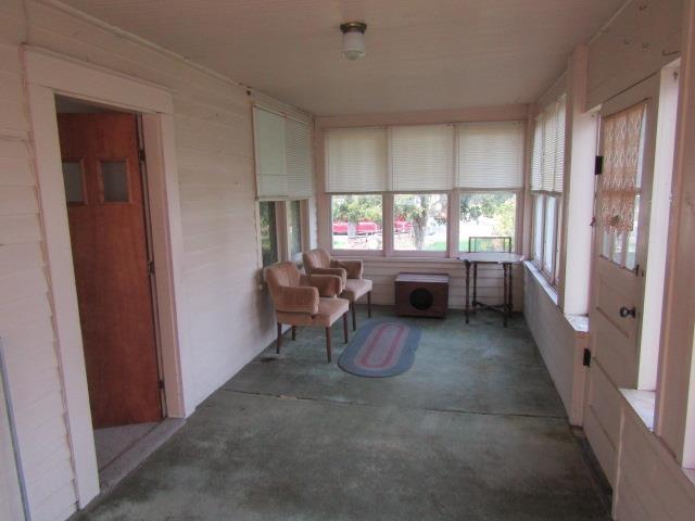 205 Pine St, Corunna, MI 48817 - sunroom / solarium with concrete floors