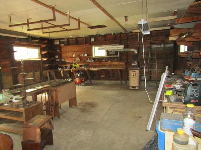 205 Pine St, Corunna, MI 48817 - garage featuring a workshop area