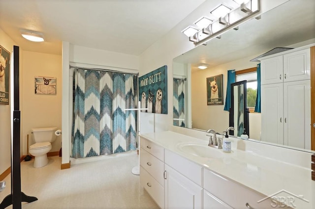 681 Quillett Dr, Beaverton, MI 48612 - bathroom featuring toilet and vanity