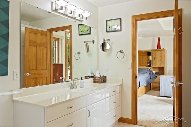 681 Quillett Dr, Beaverton, MI 48612 - bathroom with vanity and connected bathroom