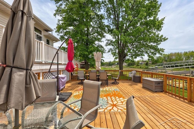 681 Quillett Dr, Beaverton, MI 48612 - deck with outdoor dining space
