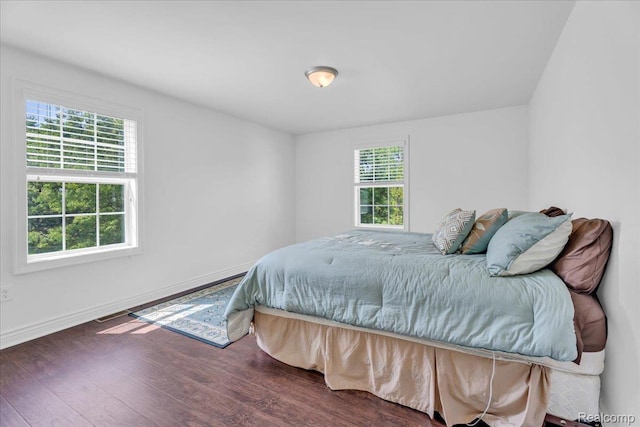 10726 Davisburg Rd, Davisburg, MI 48350 - bedroom featuring wood finished floors and baseboards
