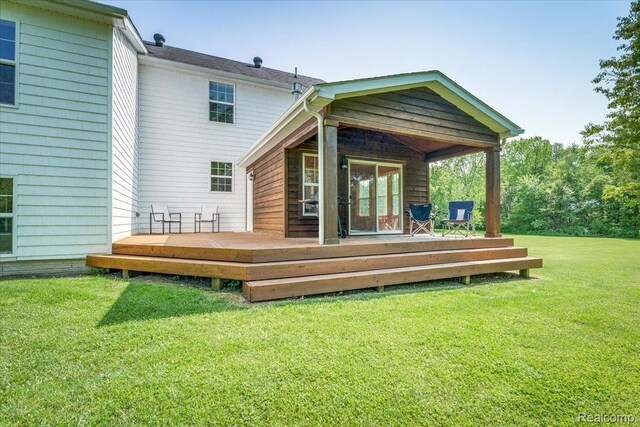 10726 Davisburg Rd, Davisburg, MI 48350 - back of property featuring a deck and a lawn