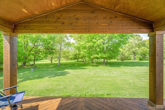 10726 Davisburg Rd, Davisburg, MI 48350 - view of grassy yard with a deck and view of wooded area
