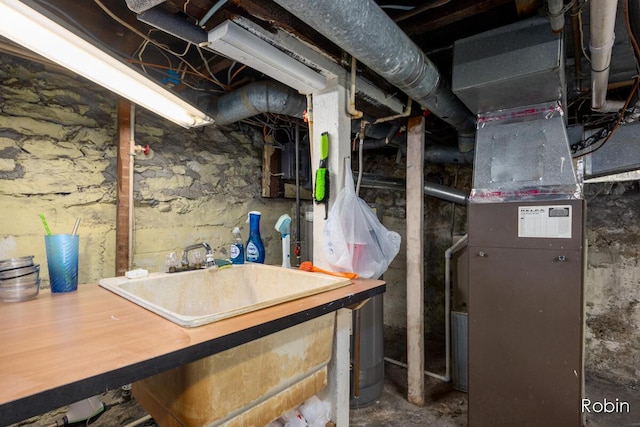 1032 White Ave NW, Grand Rapids, MI 49504 - unfinished below grade area featuring a sink