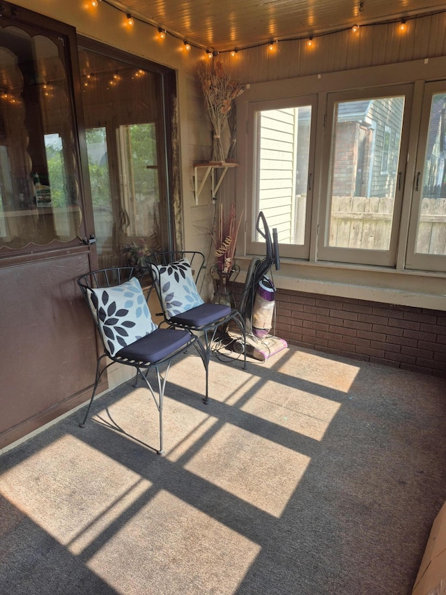 1032 White Ave NW, Grand Rapids, MI 49504 - sunroom / solarium with track lighting, carpet flooring, and french doors