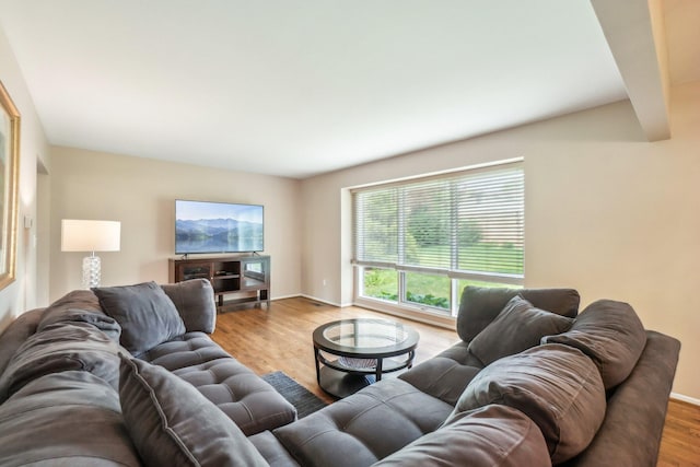 6883 Tamerlane Dr, West Bloomfield, MI 48322 - living room featuring wood finished floors and baseboards