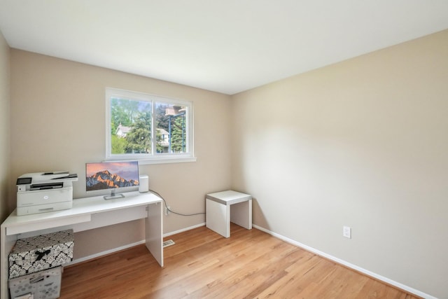 6883 Tamerlane Dr, West Bloomfield, MI 48322 - office featuring baseboards and light wood-style floors