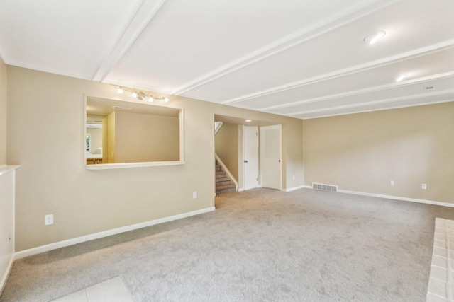 6883 Tamerlane Dr, West Bloomfield, MI 48322 - empty room featuring stairway, carpet floors, and baseboards