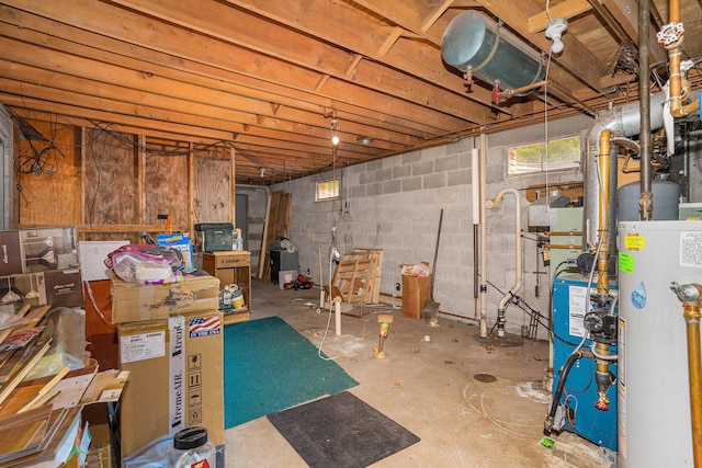 3765 Ryerson Rd, Twin Lake, MI 49457 - basement with water heater and a heating unit