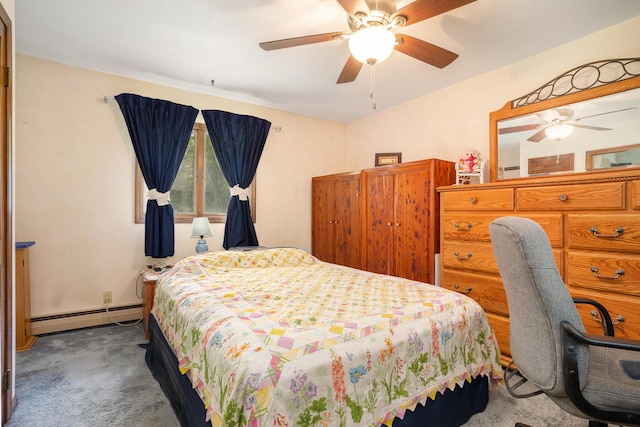 3765 Ryerson Rd, Twin Lake, MI 49457 - bedroom featuring a baseboard heating unit, carpet flooring, and ceiling fan