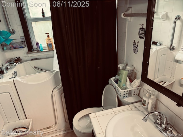 6106 E Hill Rd, Grand Blanc, MI 48439 - bathroom with toilet, a sink, a tub, and a shower with shower curtain