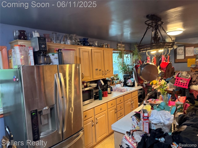 6106 E Hill Rd, Grand Blanc, MI 48439 - kitchen with stainless steel appliances, light countertops, and a sink