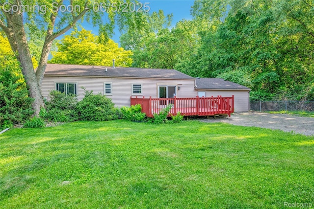 33722 Glen St, Westland, MI 48186 - rear view of property featuring a deck and a shingled roof