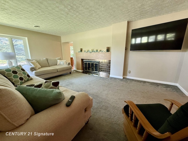 1486 Lathrup Ave, Saginaw, MI 48638 - living area featuring carpet floors, a tile fireplace, a textured ceiling, and baseboards