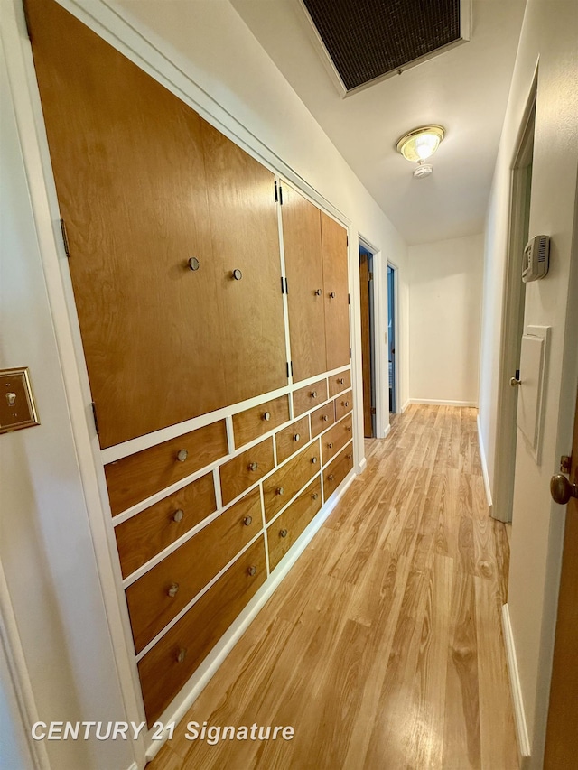 1486 Lathrup Ave, Saginaw, MI 48638 - corridor featuring light wood-style floors and baseboards