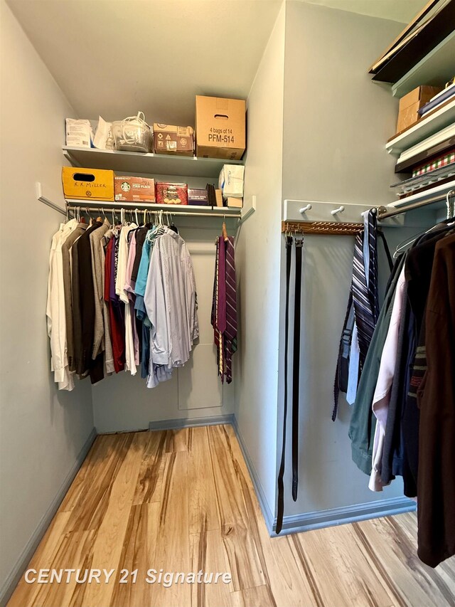1486 Lathrup Ave, Saginaw, MI 48638 - walk in closet featuring wood finished floors