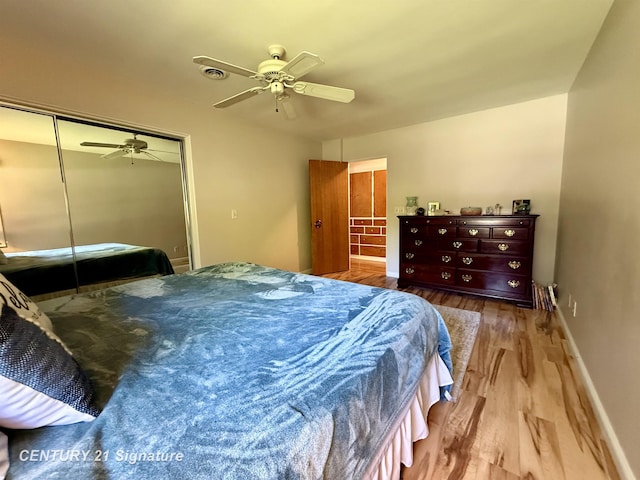 1486 Lathrup Ave, Saginaw, MI 48638 - bedroom with wood finished floors, a closet, a ceiling fan, and baseboards