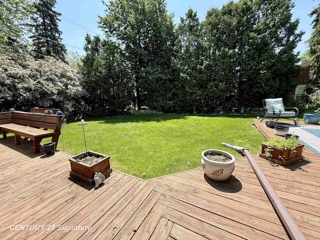1486 Lathrup Ave, Saginaw, MI 48638 - deck with a lawn