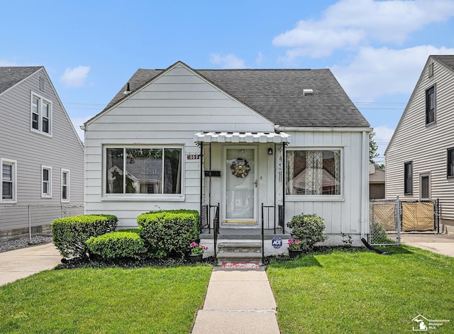 1989 Leblanc St, Lincoln Park, MI 48146 - bungalow-style house featuring board and batten siding and roof with shingles