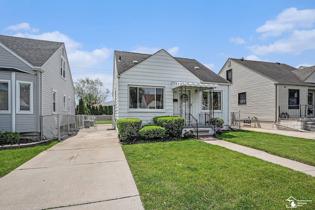 1989 Leblanc St, Lincoln Park, MI 48146 - view of front of house with roof with shingles and driveway