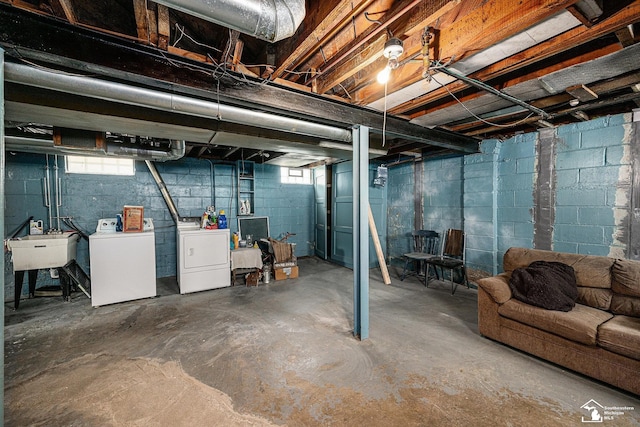 1989 Leblanc St, Lincoln Park, MI 48146 - basement featuring washer and clothes dryer, a sink, and plenty of natural light