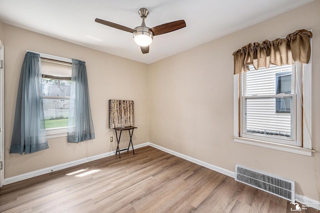 1989 Leblanc St, Lincoln Park, MI 48146 - unfurnished room featuring light wood finished floors, ceiling fan, and baseboards