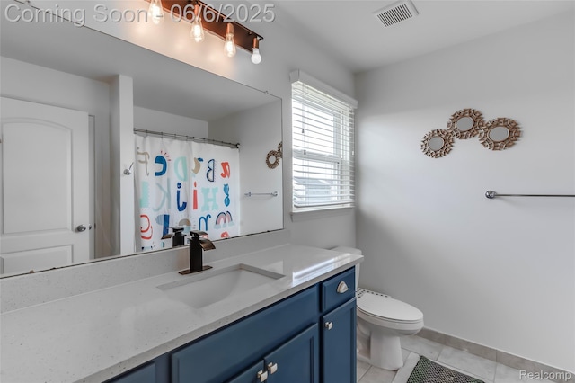 59625 Twin Pines Dr, New Hudson, MI 48165 - bathroom featuring tile patterned flooring, vanity, and toilet
