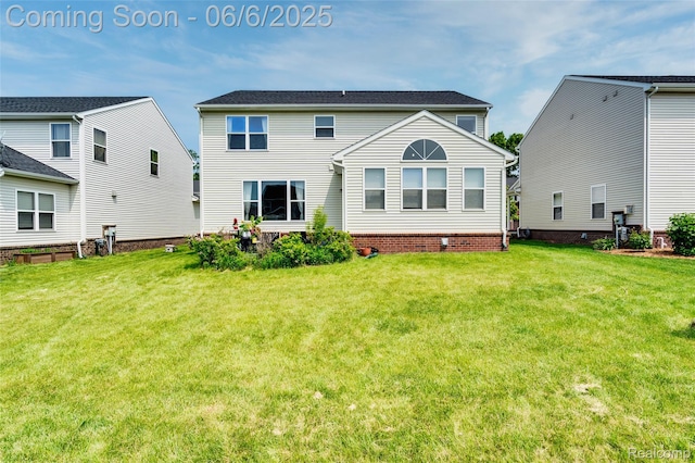 59625 Twin Pines Dr, New Hudson, MI 48165 - rear view of property with a lawn