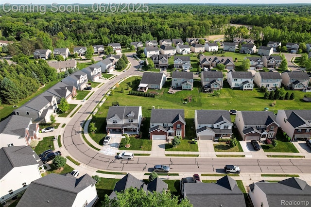 59625 Twin Pines Dr, New Hudson, MI 48165 - aerial perspective of suburban area with a forest