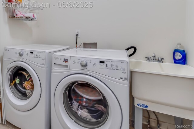 59625 Twin Pines Dr, New Hudson, MI 48165 - washroom with washing machine and clothes dryer