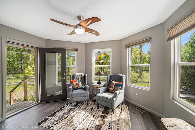 2816 W K Bar L Dr, Midland, MI 48640 - living area with baseboards, dark wood-style floors, and ceiling fan