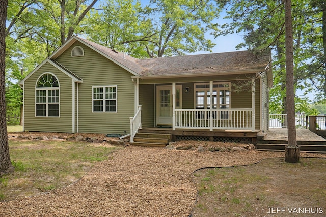 15021 S Star Lake Dr, Baldwin, MI 49304 - ranch-style home featuring covered porch and roof with shingles