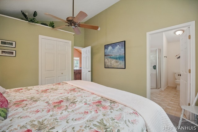 15021 S Star Lake Dr, Baldwin, MI 49304 - bedroom featuring a closet, ensuite bathroom, a ceiling fan, and high vaulted ceiling