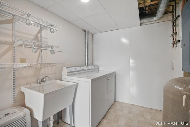 15021 S Star Lake Dr, Baldwin, MI 49304 - washroom with separate washer and dryer and light floors