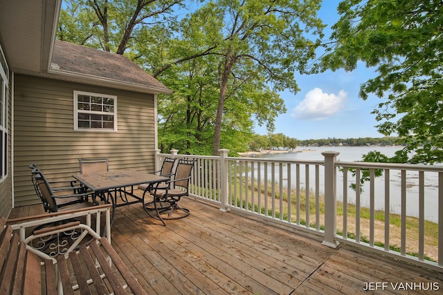 15021 S Star Lake Dr, Baldwin, MI 49304 - wooden terrace featuring a water view and outdoor dining space