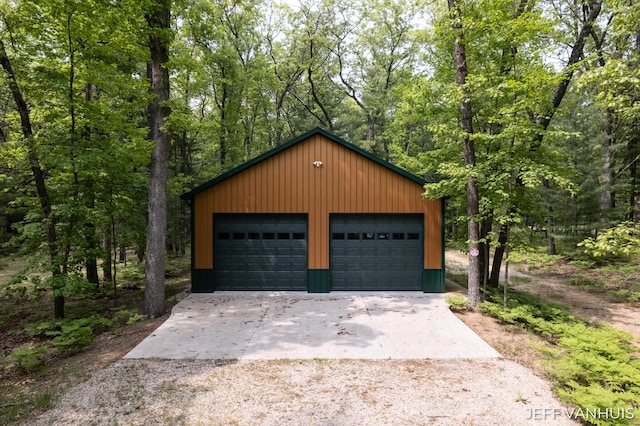 15021 S Star Lake Dr, Baldwin, MI 49304 - detached garage featuring a forest view