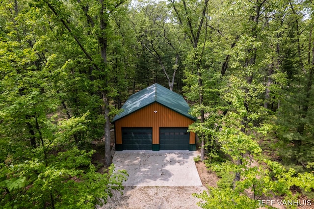 15021 S Star Lake Dr, Baldwin, MI 49304 - detached garage featuring a forest view