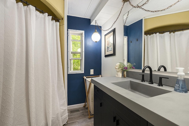3274 E Rivers Edge, Newaygo, MI 49337 - full bath featuring vanity, wood finished floors, and baseboards