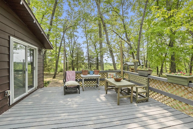 3274 E Rivers Edge, Newaygo, MI 49337 - wooden terrace featuring view of scattered trees